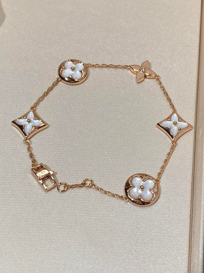 [LUXE]STAR AND SUN 5 MOTIF MOP PINK GOLD BRACELET