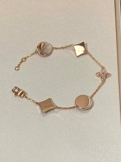 [LUXE]STAR AND SUN 5 MOTIF MOP PINK GOLD BRACELET