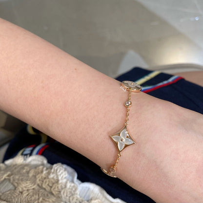 [LUXE]STAR AND SUN 4 MOTIF WHITE MOP PINK GOLD BRACELET