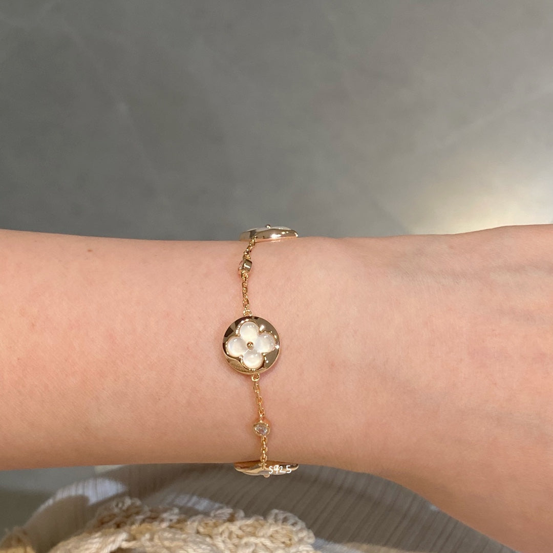 [LUXE]STAR AND SUN 4 MOTIF WHITE MOP PINK GOLD BRACELET